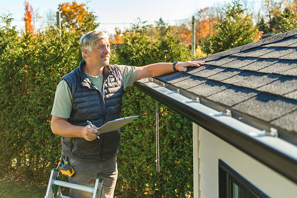 Professional Roof Replacement technician working in Freeport, ME